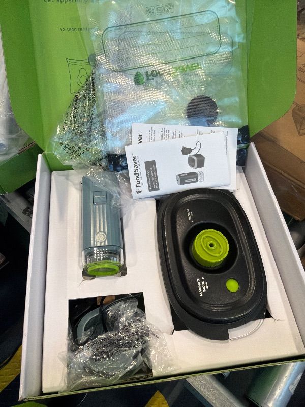 Photo 1 of **UNTESTED**
FoodSaver Mini Handheld Vacuum Sealer Machine with Marinate Setting & Charging Dock, Cordless Food Vacuum Sealer for Freezer, Storage, Sous Vide, Meal Prep, Blue