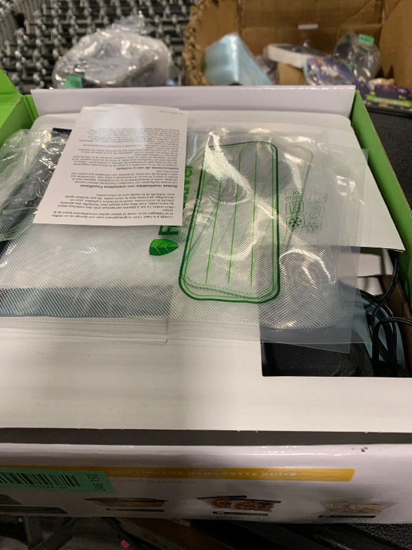 Photo 1 of **UNTESTED**
FoodSaver Mini Handheld Vacuum Sealer Machine with Marinate Setting & Charging Dock, Cordless Food Vacuum Sealer for Freezer, Storage, Sous Vide, Meal Prep, Blue