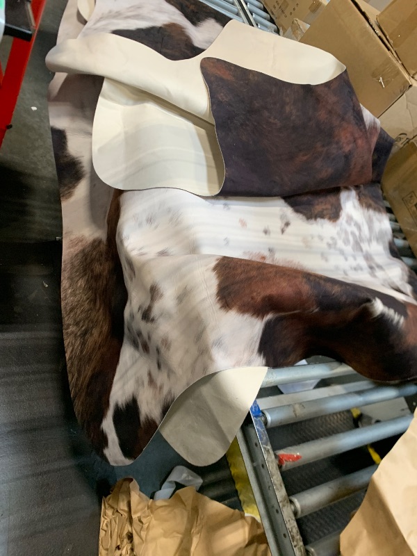 Photo 1 of ****SIMILAR***

Cowhide Rug 8x10 FT Faux Cow Print Rugs Large Non-Slip Cow Hide Area Carpet Animal Print Rugs Western Home Decor for Living Room Bedroom Diningroom Office