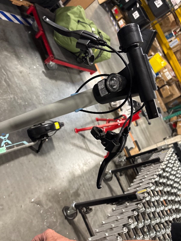 Photo 1 of **MISSING HANDLES CHARGER**
Hover-1 Alpha Foldable Electric Scooter with 450W Brushless Motor, 18 mph Max Speed, 10” Air-Filled Tires and 12 Mile Range