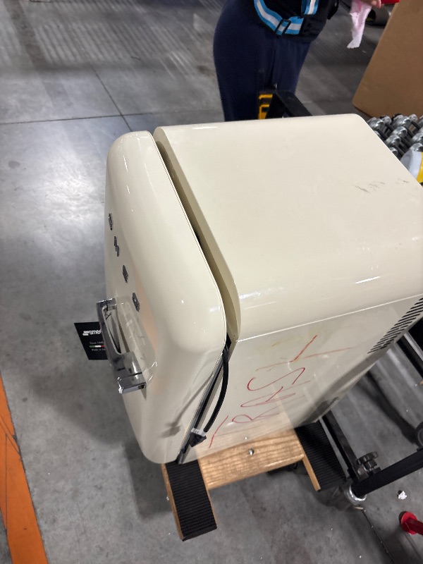 Photo 1 of *FINAL SALE*DAMAGED**HAS WRITING ON IT** MISSING THE BOTTOM PIECE***
Smeg FAB10 50's Retro Style Aesthetic Refrigerator with 4.48 Cu Total Capacity, 2 Glass Shelves, LED Internal Light, 22-Inches, Cream Right Hand Hinge Made In Italy