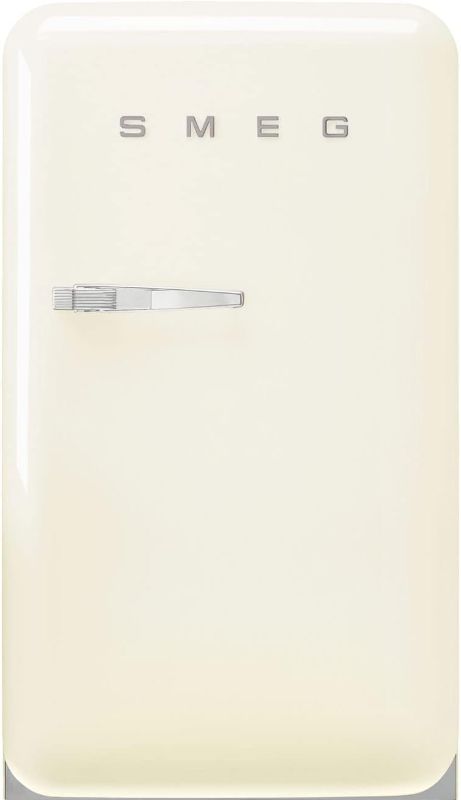 Photo 1 of *FINAL SALE*DAMAGED**HAS WRITING ON IT** MISSING THE BOTTOM PIECE***
Smeg FAB10 50's Retro Style Aesthetic Refrigerator with 4.48 Cu Total Capacity, 2 Glass Shelves, LED Internal Light, 22-Inches, Cream Right Hand Hinge Made In Italy
