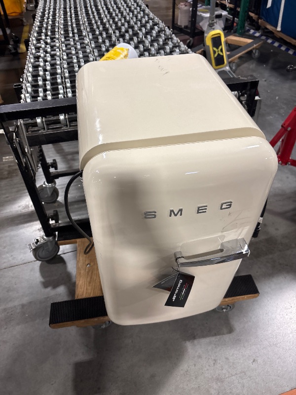 Photo 1 of *FINAL SALE*DAMAGED**HAS WRITING ON IT** MISSING THE BOTTOM PIECE***
Smeg FAB10 50's Retro Style Aesthetic Refrigerator with 4.48 Cu Total Capacity, 2 Glass Shelves, LED Internal Light, 22-Inches, Cream Right Hand Hinge Made In Italy