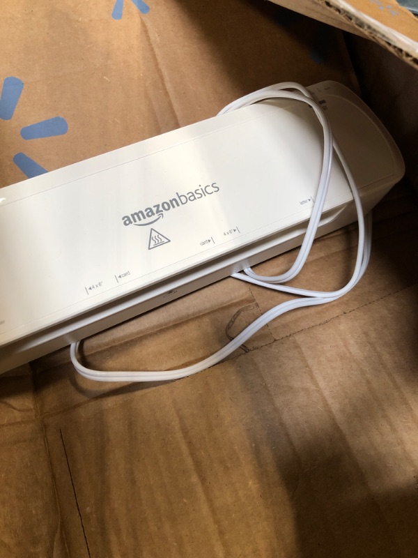 Photo 1 of *** SIMILAR IMAGE***Amazon Basics 12 inch Thermal Laminator Machine, 1 Min Warm-Up, Home/Office/School Use, 20 Pouches Included, White