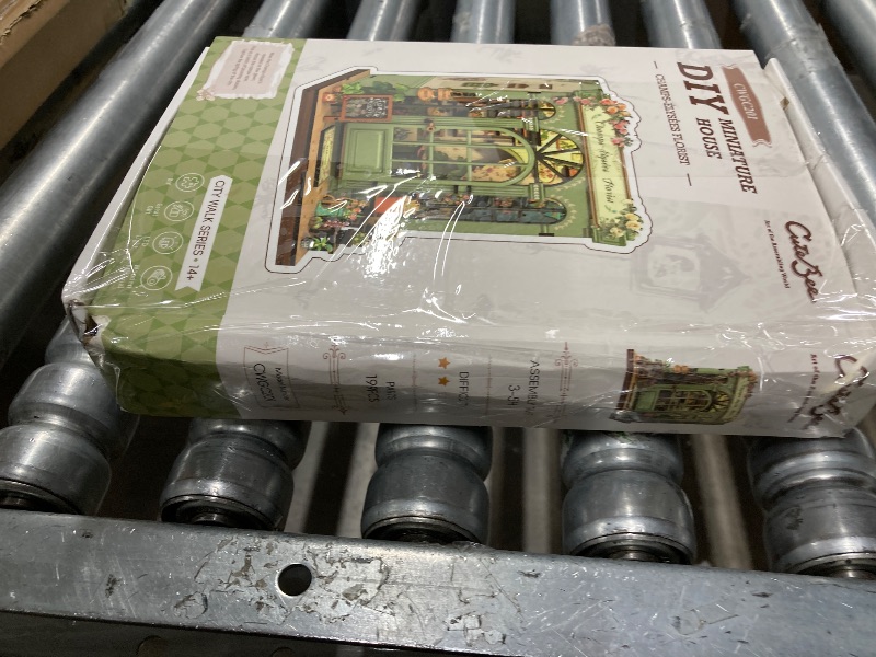 Photo 1 of **DAMAGED PACKAGE**CUTEBEE Book Nook Kit - DIY Miniature House Dollhouse Kit for Adults and Teens, Booknook Tiny House Bookshelf Decor 3D Wooden Puzzle, Gifts for Family, Friends (Champs-Élysées Florist)