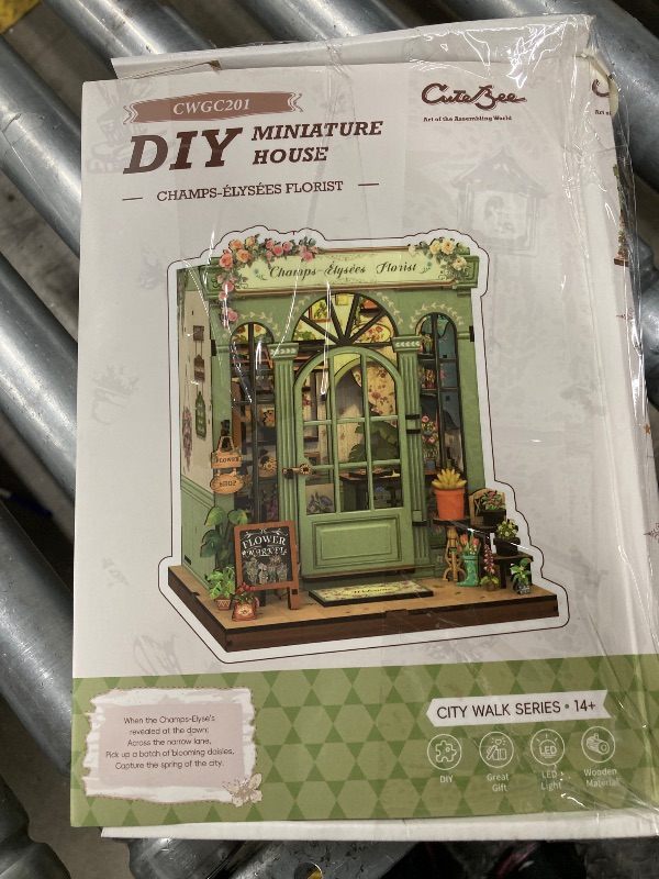 Photo 1 of **DAMAGED PACKAGE**CUTEBEE Book Nook Kit - DIY Miniature House Dollhouse Kit for Adults and Teens, Booknook Tiny House Bookshelf Decor 3D Wooden Puzzle, Gifts for Family, Friends (Champs-Élysées Florist)