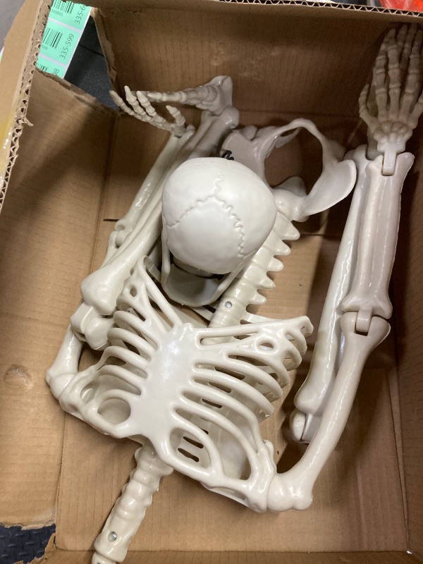 Photo 1 of 15 Inches Halloween Skeleton, LED Light Up Glowing Eyes Pose-N-Stay Halloween Skeleton Full Body Posable Movable Jonints for Halloween Decoration