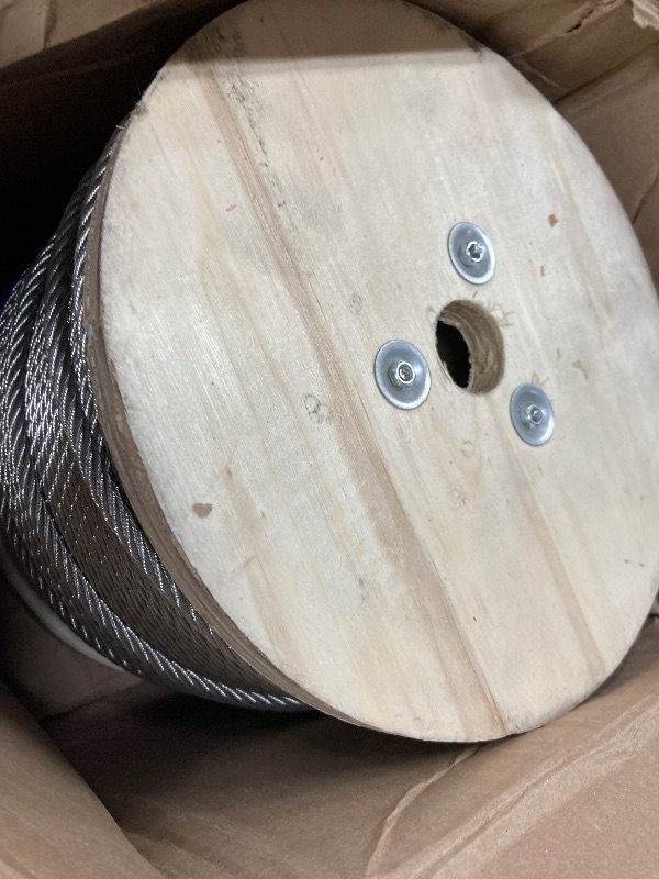 Photo 1 of 1/4" Stainless Steel Cable,7x19 Strand Aircraft Wire Rope,Cable for Heavy Duty Applications,Outdoor Pulley Cables,Deck Railing, with Gloves,Breaking Strength 6400 Ibs,600FT