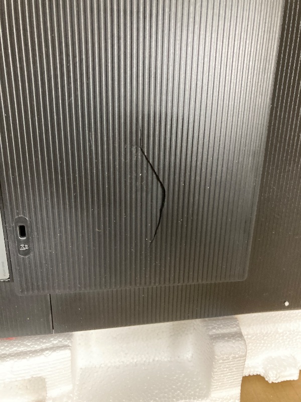 Photo 1 of **POWERS ON/HAS CRACK IN BACK-SEE PIC**Samsung 24" (S30GD) Essential Monitor with IPS Panel and Tilt Only Stand, 100Hz Refresh Rate, Ergonomic Design, Advanced Eye Care, Game Mode, LS24D304GANXZA