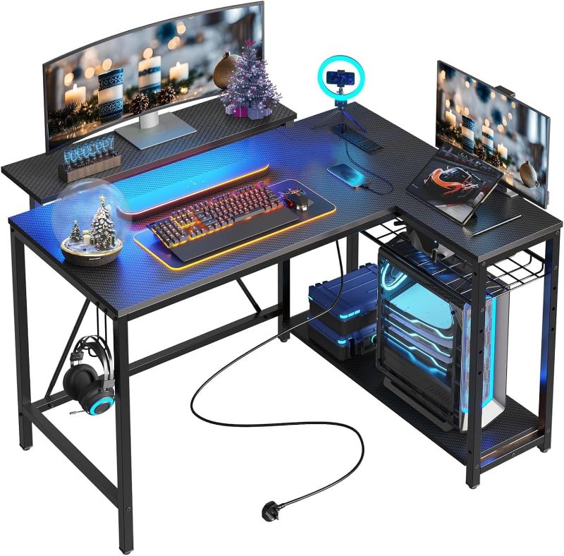 Photo 1 of ***MISSING PARTS***Bestier - Gaming Desk with Power Outlets, 42-inch L-Shaped Computer Desk with LED Lights, Desk with Reversible Storage Shelves and Hooks