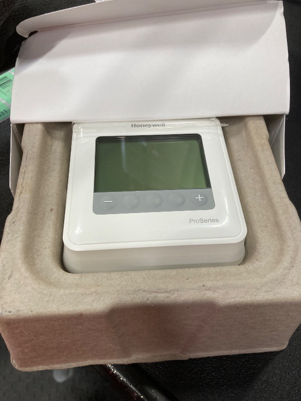 Photo 1 of **NO BOX**HONEYWELL TH4110U2005/U HONEYWELL-TH4110U2005/U-T4 Pro Thermostat, Programmable or Non-Programmable, 1H/1C, White