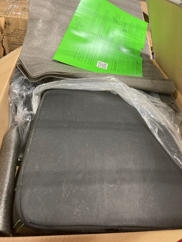 Photo 1 of **HAS TEARS**Razer Enki Gaming Chair: All-Day Comfort - Built-in Lumbar Arch - Optimized Cushion Density - Dual-Textured, Eco-Friendly Synthetic Leather - Reactive Seat Tilt & 152-Degree Recline - Black/Green