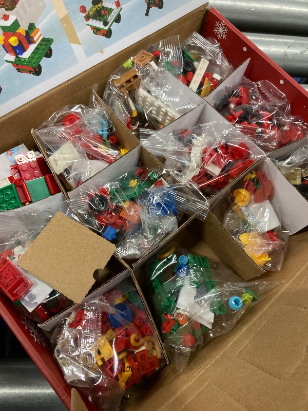 Photo 1 of ***USED/OPENED SELLING AS IS)*** gogonova Advent Calendar 2025 Train Building Blocks Set,760 PCS Surprise Christmas Countdown Gifts,12 Days Building Toys for Kids, Boys, Girls, Teens & Adults Ages 6+