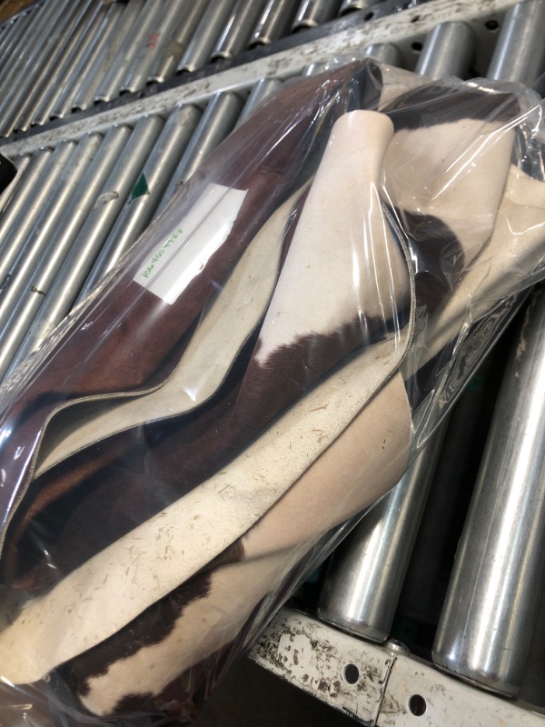 Photo 1 of ***DAMAGED - SEE NOTES/PICTURES*** SVATOUCH Premium Cowhide Rug 6 x 7.2 Feet,Western Decor Faux Cowhide,Thickened Cow Print,Cow Rug for Bedroom Living Room Home Office Decor