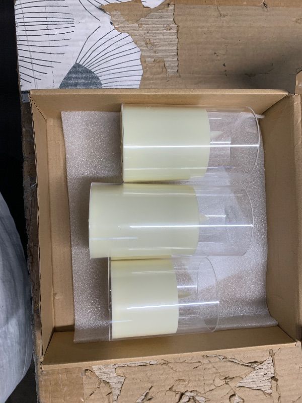 Photo 1 of ** only 3 and no remote**
Amagic Pure White Flameless Candles, Battery Operated Candles, Acrylic Flickering LED Pillar Candles with Remote Control and Timer, 3D Wick, Yellow and Blue Glow, D2.2 xH5 5" 6" 7" 8", Set of 5