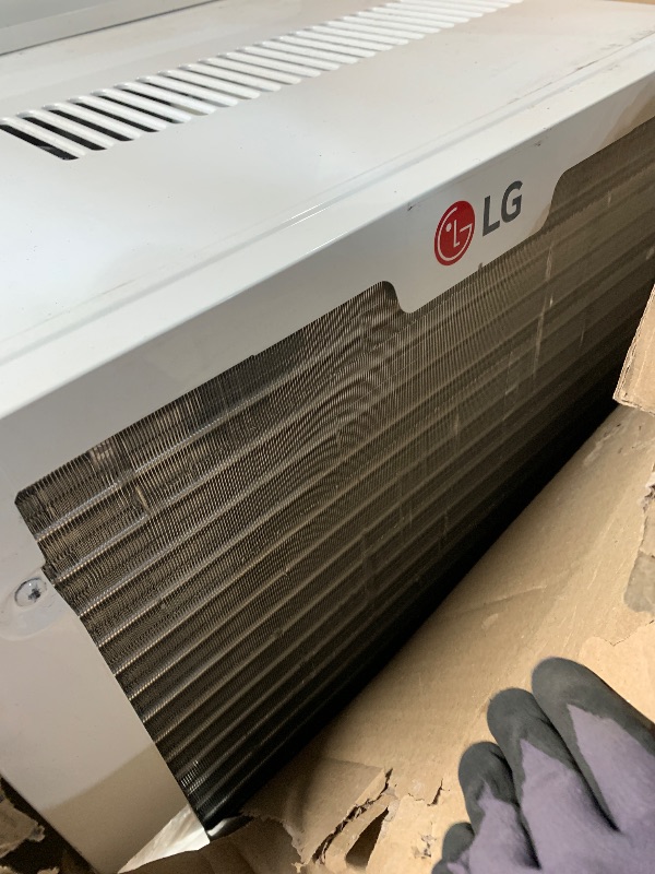 Photo 1 of ***DAMAGED, SEE PHOTOS*** 
LG 10000 BTU Window Air Conditioners [2023] Remote Control WiFi App Ultra-Quiet Washable Filter Cools 450Sq.Ft for Medium & Large Room AC Unit air conditioner Easy Install White LW1017ERSM1