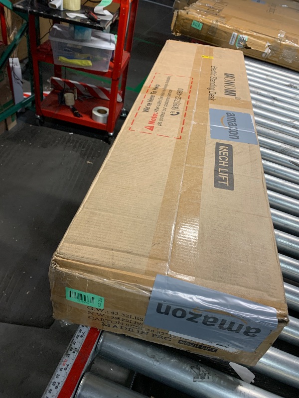 Photo 1 of ***FACTORY SEALED*** 
Monomi Electric Height Adjustable Standing Desk, 48x24 Inches, Ergonomic Home Office Sit/Stand Up Desk with Two-Piece Desktop (Black Steel Frame/Rustic Brown Top)