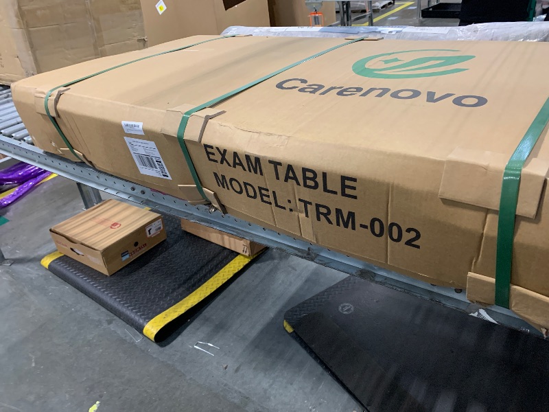 Photo 1 of ****FACTORY SEALED**** Carenovo Medical Examination Table with Wooden Base, Navy Blue Padded Surface, (Blue) (Pink)