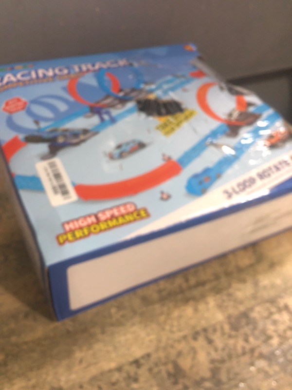 Photo 1 of ?Slot Car Race Track Sets with 360° Thrill Loops & 4 High-Speed Cars, 64 Pcs Large Flexible Racing Track for Kids Ages 3-5 4-8 8-12, Race Car Toys Gift for Boys Girls Birthday Christmas