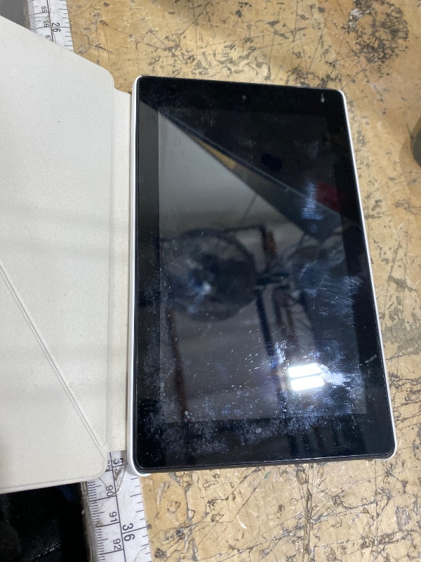 Photo 1 of ** NEED CHARGED**
BLACK AMAZON TABLET WHIT STAR WARS CASE

