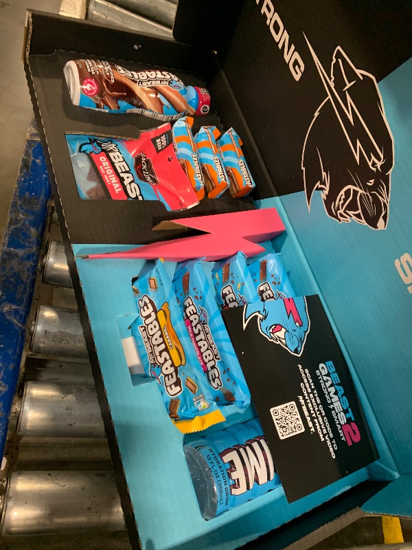 Photo 1 of *****exp 08/2026*****Feastables Beast Games Season 2 Snack Bundle, 10 Count, MrBeast Chocolate Bars & Cups, Protein Milk, Hydration Drink & Beef Jerky