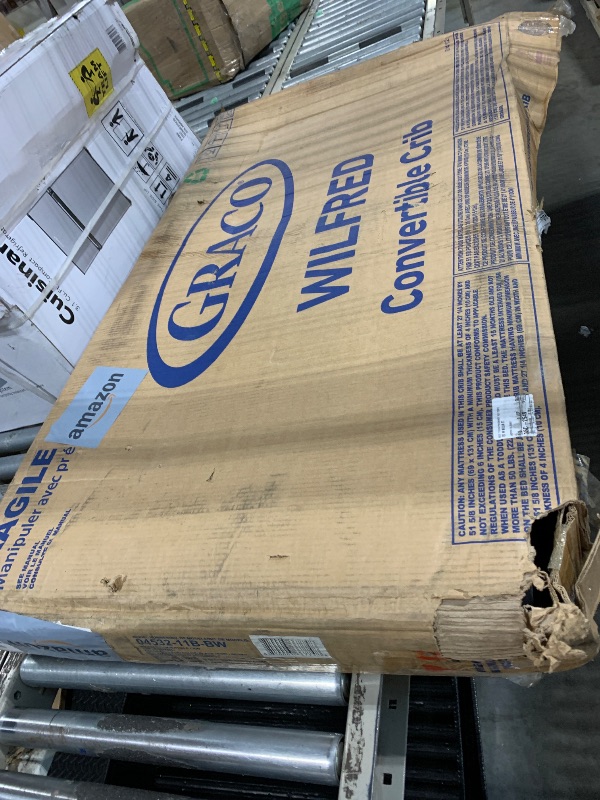 Photo 1 of **MAJOR DAMAGE**
Graco Wilfred 5-in-1 Convertible Crib (Black) – GREENGUARD Gold Certified, Converts to Toddler Bed and Full-Size Bed, Fits Standard Full-Size Crib Mattress, Adjustable Mattress Support Base