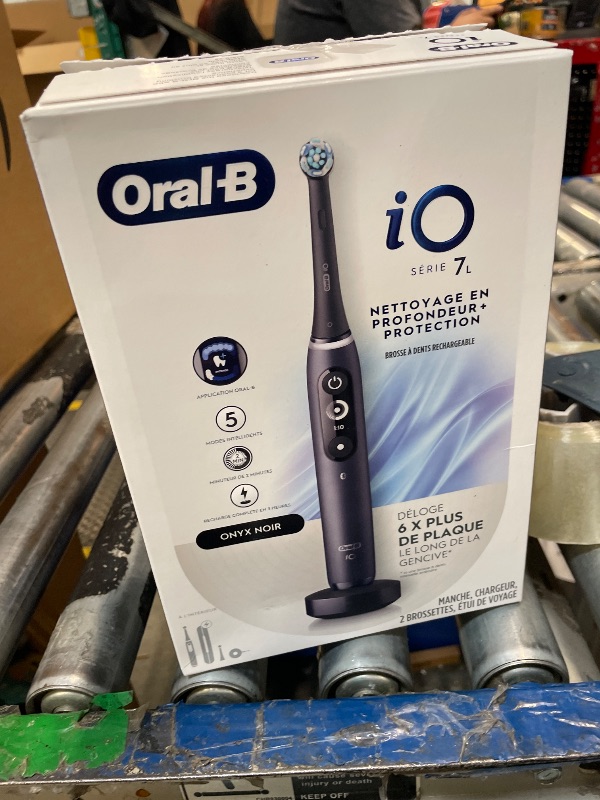 Photo 1 of ***UNCLEAN***Oral-B iO Deep Clean + Protect Rechargeable Electric Toothbrush, Black, iO Series 7, 2 Replacement Brush Heads, Charging Travel Case