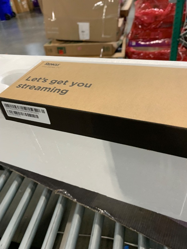 Photo 1 of **UNTESTED** **SOLD FOR PARTS** Roku Smart TV – 75-Inch Pro Series 4K QLED RokuTV with Backlit Roku Voice Remote Pro, Dolby Vision IQ, 120Hz Refresh Rate – Live Local News, Sports, Gaming