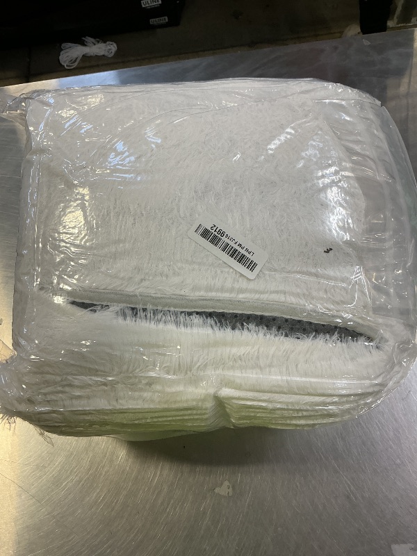 Photo 1 of CAIYUECS Shag Area Rug,Indoor Ultra Soft Fluffy Plush Rugs for Bedroom Living Room, Non-Skid Modern Nursery Faux Fur Rugs for Kids Room Home Decor (5x7 Feet, Black)