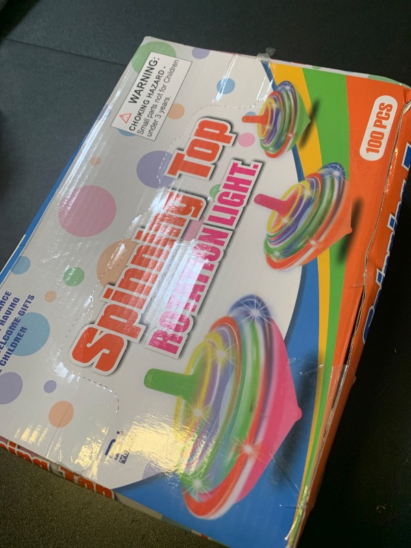 Photo 1 of 100 Pieces LED Light Up Flashing Mini Spinning Tops with Gyroscope - Kids Novelty Bulk Spin Toys Party Favors Bundle Pack Multicolored