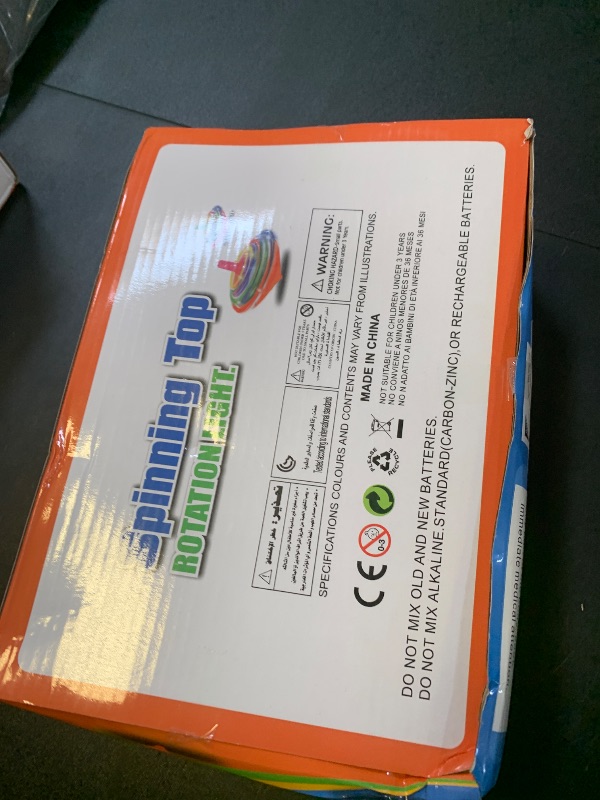 Photo 1 of 100 Pieces LED Light Up Flashing Mini Spinning Tops with Gyroscope - Kids Novelty Bulk Spin Toys Party Favors Bundle Pack Multicolored