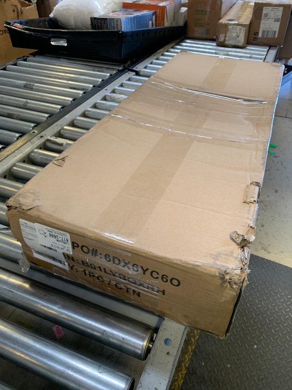 Photo 1 of Amazon Basics 4-Shelf Adjustable Heavy Duty Steel Wire Rack Storage Shelving Organizer for Kitchen, Garage, 36" L x 14" W x 54" H, Black