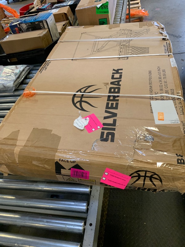 Photo 1 of Silverback NXT 54" Wall Mounted Adjustable-Height Basketball Hoop with QuickPlay Design