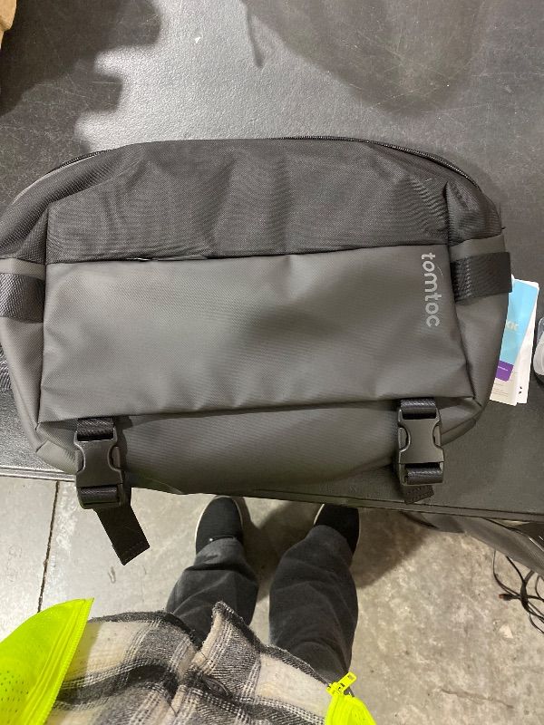 Photo 1 of tomtoc backpack - color black