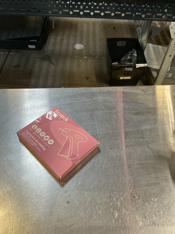 Photo 1 of Scopck Handheld Micro Tagging Stitch Gun for Clothes - Quick Clothing Fixer - Mini Sewing Kit - Includes 6 Needle, 1000 Black Fasteners & 1000 White Fasteners (Purple)