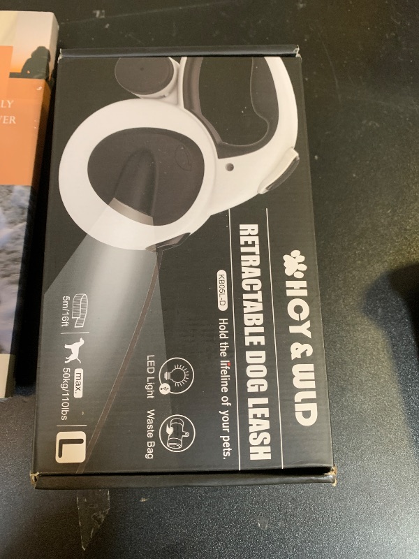 Photo 1 of HCY&WLD Upgrade 4-in-1 Retractable Dog Leash with LED Light & Dispenser & Poop Bags, 16 ft Heavy Duty Dog Leash with Anti-Slip Handle for Dogs up to 110 lbs, 360° Tangle-Free, One Button Brake & Lock