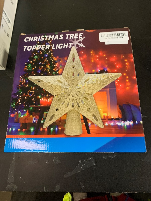 Photo 1 of 10" Christmas Tree Topper Projector with 6 Projection Modes, Lighted Christmas Tree Topper Star Built-in LED Rotation Light, 3D Glitter Dynamic TreeTop for Xmas Holiday Party Decorations Gift (Silver)