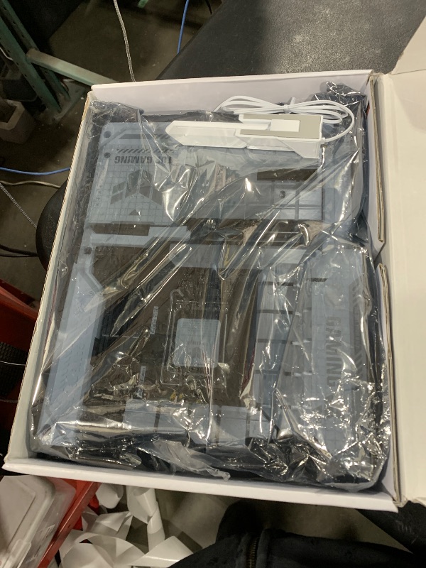 Photo 1 of This is an ASUS TUF Gaming Z790-BTF WIFI motherboard. 
