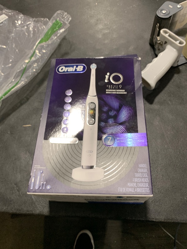 Photo 1 of Oral-B iO Series 9 Electric Toothbrush with 3 Replacement Brush Heads, White Alabaster