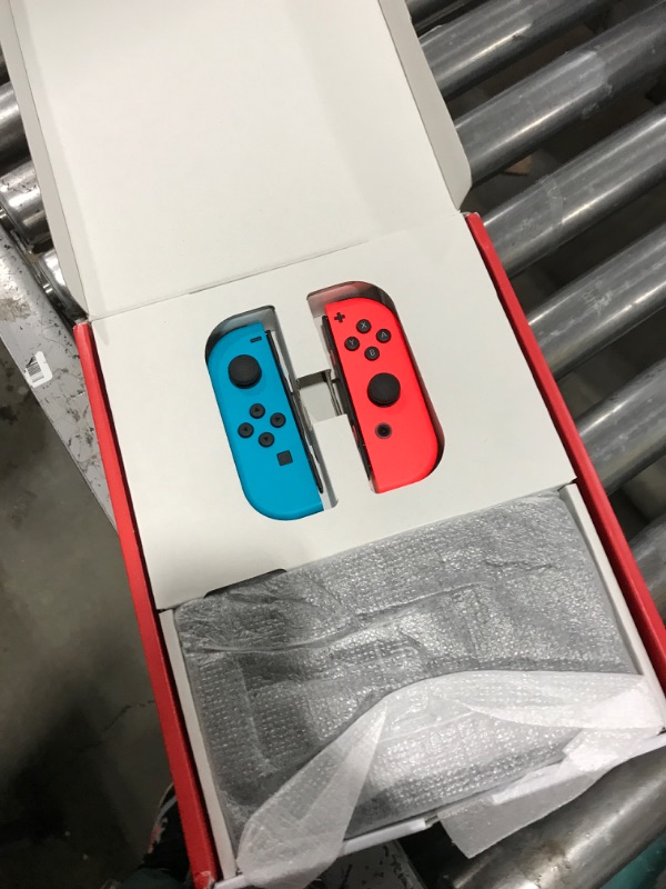 Photo 1 of Nintendo Switch™ with Neon Blue and Neon Red Joy?Con™