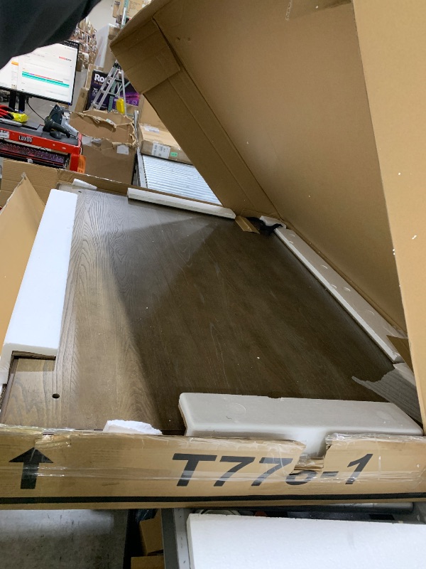 Photo 1 of Signature Design by Ashley Johnelle Farmhouse Coffee Table with Weathered Gray Finish, Gray