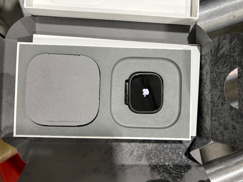 Photo 1 of Apple Watch Ultra 2 [GPS + Cellular 49mm] Smartwatch, Sport Watch with Black Titanium Case with Dark Green Alpine Loop - M. Fitness Tracker, Precision GPS, Action Button, Carbon Neutral
