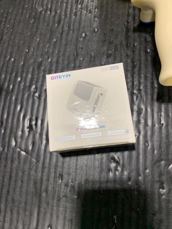 Photo 1 of Gitryin Portable USB Phone Charger Block, Retractable Wall Charger with 33.5in Retractable Lightning Cable, 40W Fast Charging Block with USB C Port, Power Adapter with Foldable Plug for iPhone14/13/12