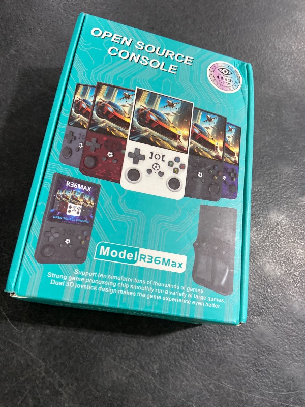 Photo 1 of ?R36MAX 4000mAh Portable Rechargeable Handheld Retro Game Console,Comfort Non-Slip Handheld Standing Retro Game Console with 64G TF Car,4.0-inch Screen,for Office,Purple Gray