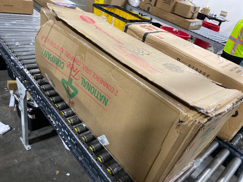 Photo 1 of National Tree Company 7.5 ft Pre-Lit Downswept Douglas Fir Full Artificial Christmas Tree, 750 Clear Lights, 1867 Tips, Includes Stand, Green