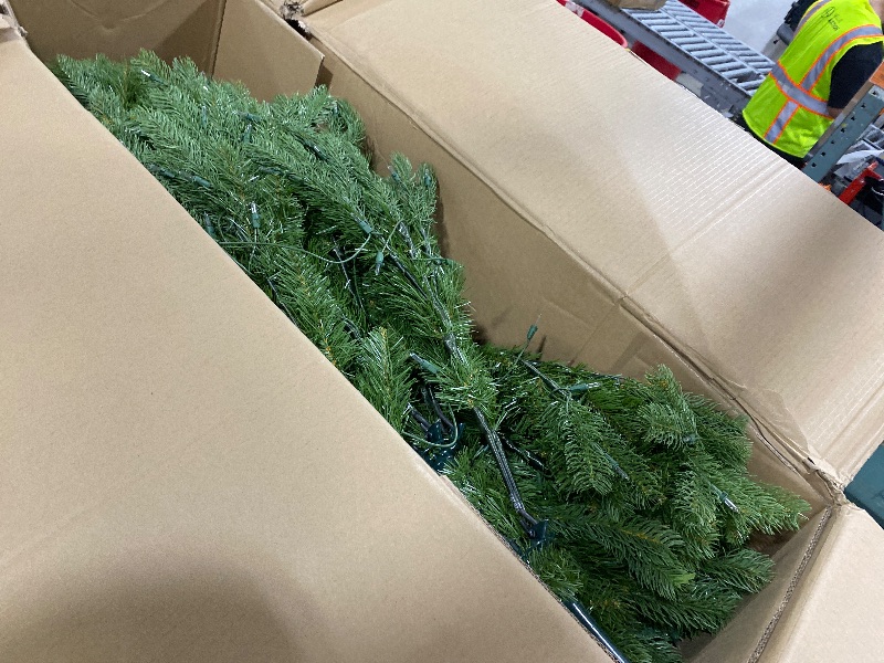 Photo 1 of National Tree Company 7.5 ft Pre-Lit Downswept Douglas Fir Full Artificial Christmas Tree, 750 Clear Lights, 1867 Tips, Includes Stand, Green