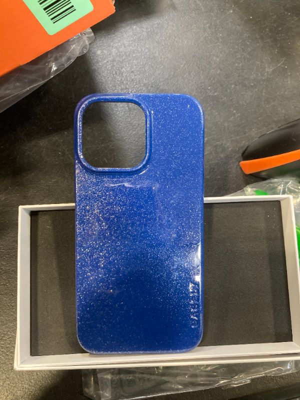 Photo 1 of CASETIFY BLUE GLITTER PHONE CASE- UNKNOWN MAKE AND MODEL PHONE.