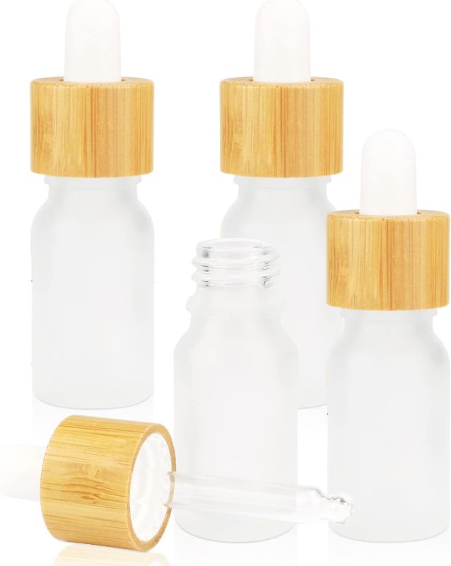 Photo 1 of 4 Pack Frosted Glass Dropper Bottles,Essential Oil Bottles With Eye Dropper And Bamboo Lids Perfume Sample Vials Essence Liquid Cosmetic Containers (10ml/0.3oz)