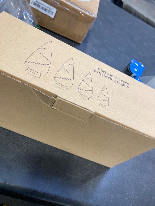 Photo 1 of 4 PCS Mini Christmas Trees, 4 Sizes Artificial Christmas Trees with 2 Modes LED String Lights Timer, Bottle Brush Trees Battery Powered Tabletop Tree Decoration (Warm White)