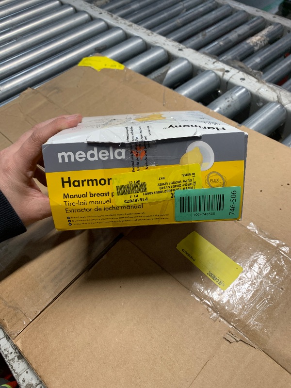 Photo 1 of ***FACTORY SEALED***OPENED TO SHOW PRODUCT*** Medela Harmony Manual Breast Pump, Compact Swiss Design with PersonalFit Flex Shields and Medela's 2-Phase Expression Technology